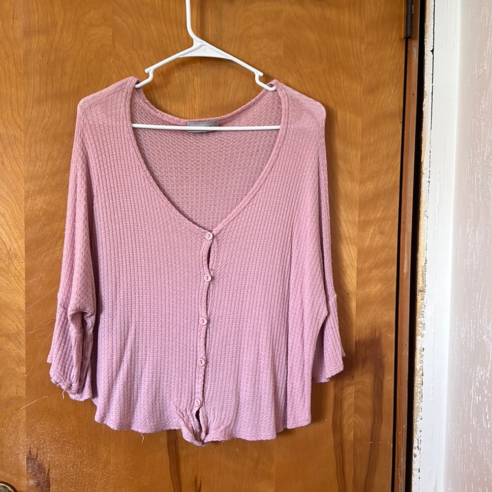 Pink button down shirt with half sleeve. Very loose fitting